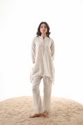 Aks Asymmetric Hem Co-ord Set with Flared Pants & Handwork Detailing - Almond Dust