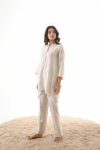 Aks Asymmetric Hem Co-ord Set with Flared Pants & Handwork Detailing - Almond Dust