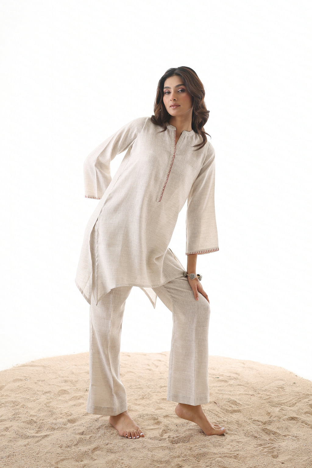 Aks Asymmetric Hem Co-ord Set with Flared Pants & Handwork Detailing - Almond Dust