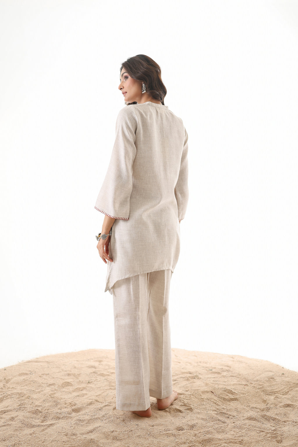 Aks Asymmetric Hem Co-ord Set with Flared Pants & Handwork Detailing - Almond Dust
