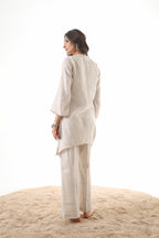 Aks Asymmetric Hem Co-ord Set with Flared Pants & Handwork Detailing - Almond Dust